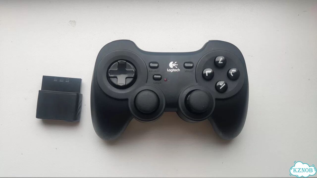 Logitech ps2 беспроводной геймпад фото 1