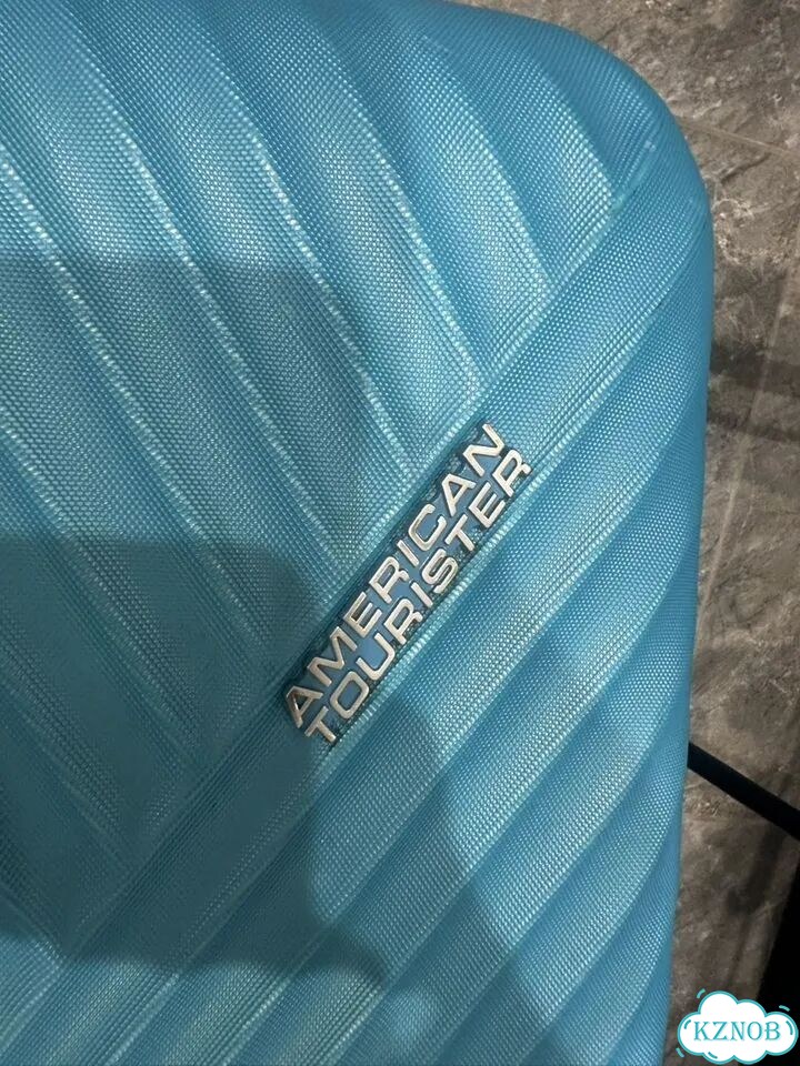 Чемодан на колесах american tourister размер m фото 2
