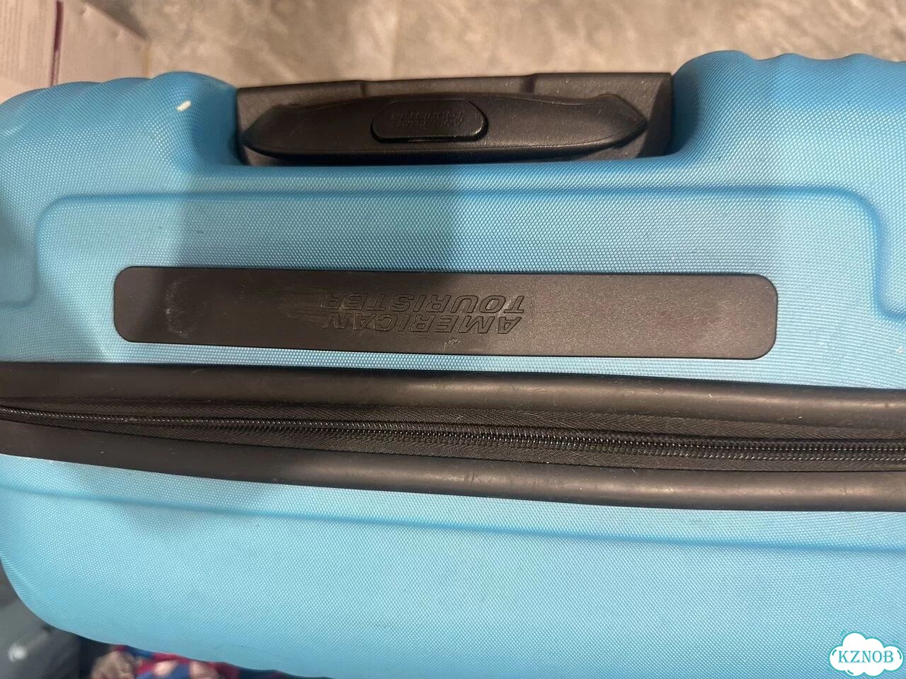 Чемодан на колесах american tourister размер m фото 7